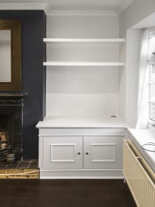 Traditional style alcove fitted TV cabinets with chunky and open shelving