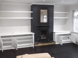 Traditional style alcove fitted TV cabinets with chunky and open shelving