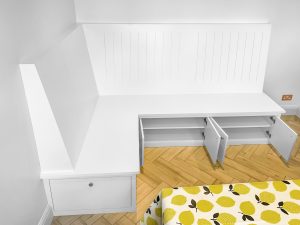 Fitted L-shape bench. A nice mixture of sitting space, drawer and storage with doors and shelving. One of the best solutions for a dining room.