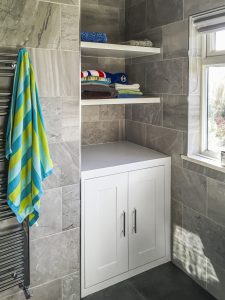 Bathroom bookcase with floating shelves. Made from humidity resistant MDF