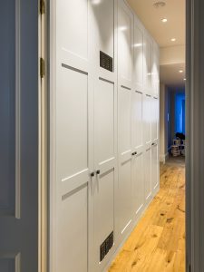 A huge wardrobe with media system and ventilation system installed