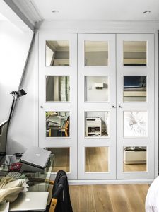 Art wardrobe with mirrored doors