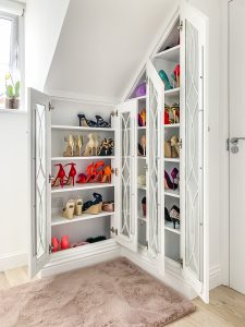 Loft Wardrobe with glass doors, fretwork and LED lighting inside