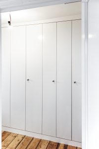 Laundry wardrobe with bi-folding doors. Includes space for laundry, washing machine, dryer, boiler and ect.