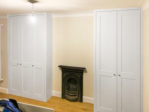 Alcove Fitted Wardrobes besides the Chimney