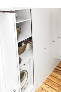 Laundry wardrobe with bi-folding doors. Includes space for laundry, washing machine, dryer, boiler and ect.