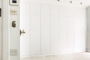 Bi-folded Doors Huge Contemporary Style Fitted Wardrobe.