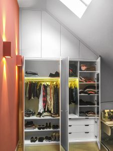 A huge contemporary style fitted Wardrobe with LED lighting.