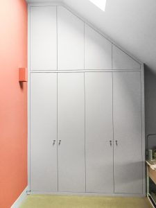 A huge contemporary style fitted Wardrobe with LED lighting.