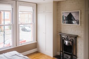 Alcove Fitted Wardrobes besides the Chimney