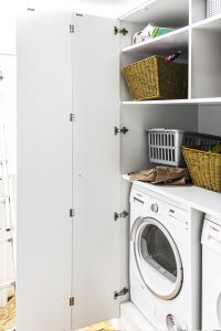 Laundry wardrobe with bi-folding doors. Includes space for laundry, washing machine, dryer, boiler and ect.